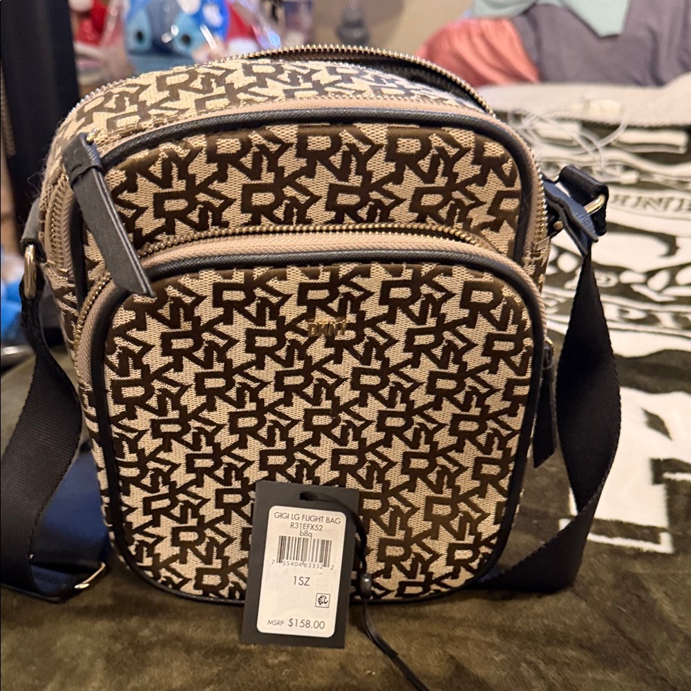 DKNY womans crossbody Bag - Black and Tan Pattern